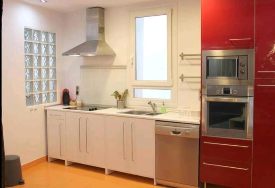 Kitchen or kitchenette, microwave, oven, stove