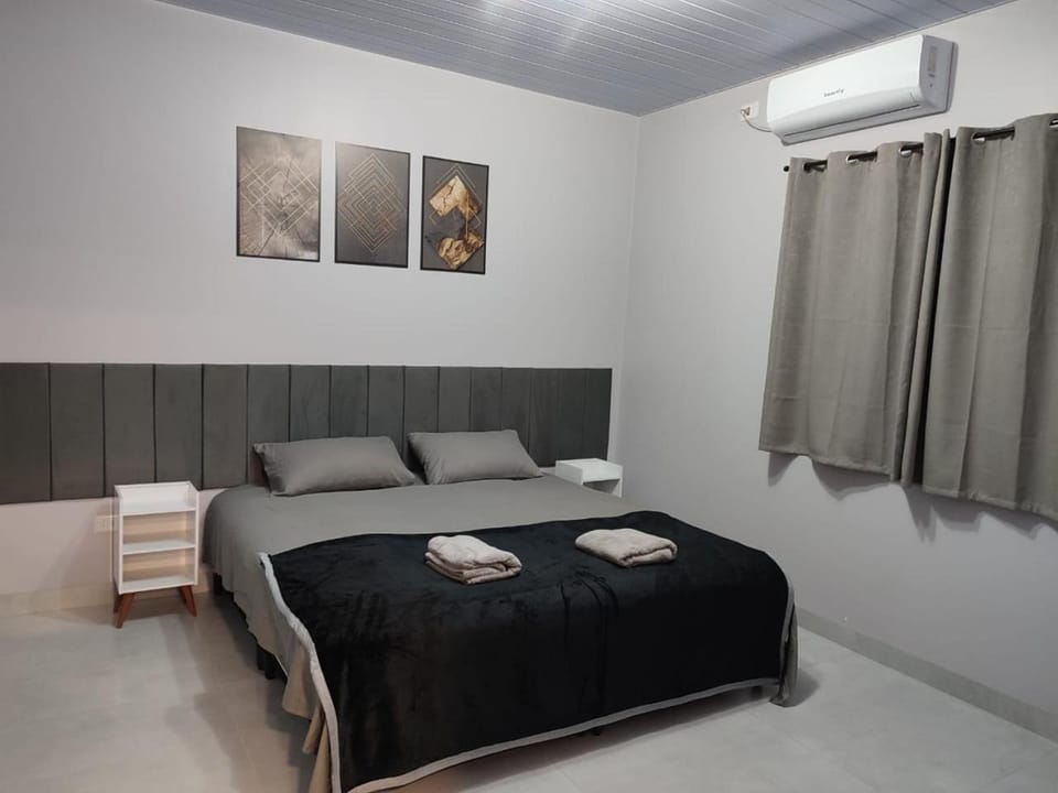 Aconchego moderno , todos os quartos com ar Villa in State of Paraná