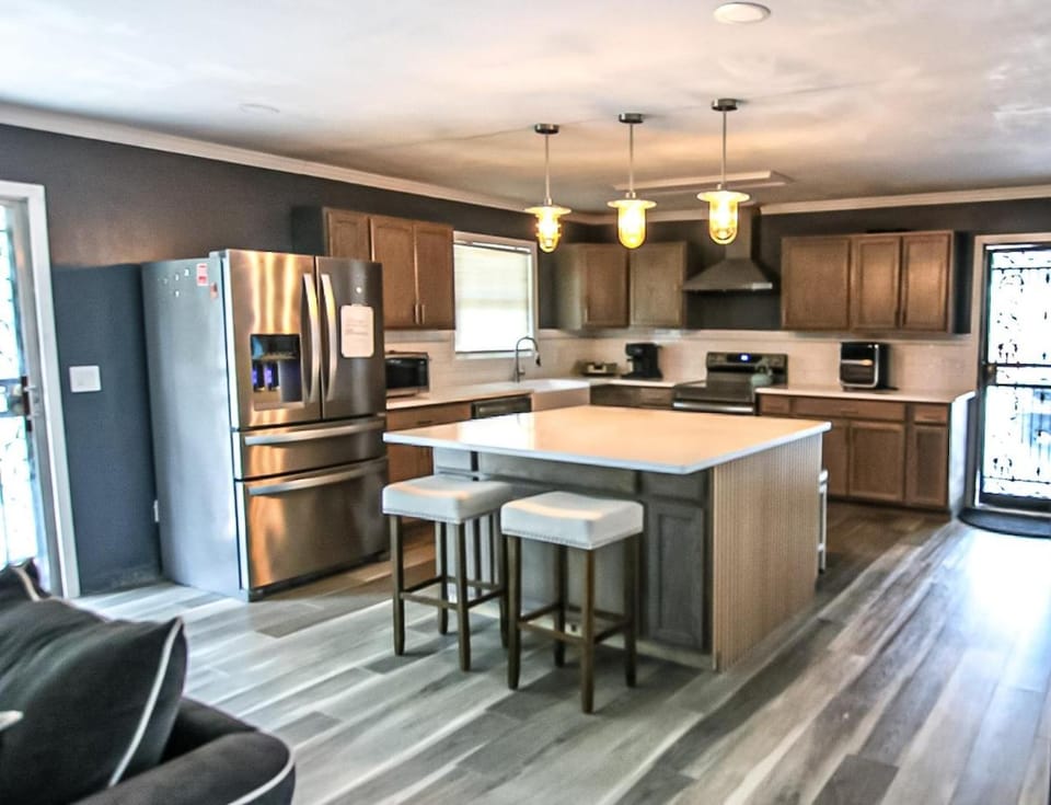 Kitchen or kitchenette, dishwasher, oven, stove, toaster