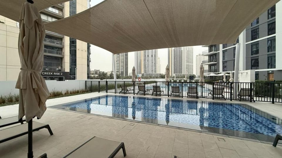 Swimming pool, sunbed