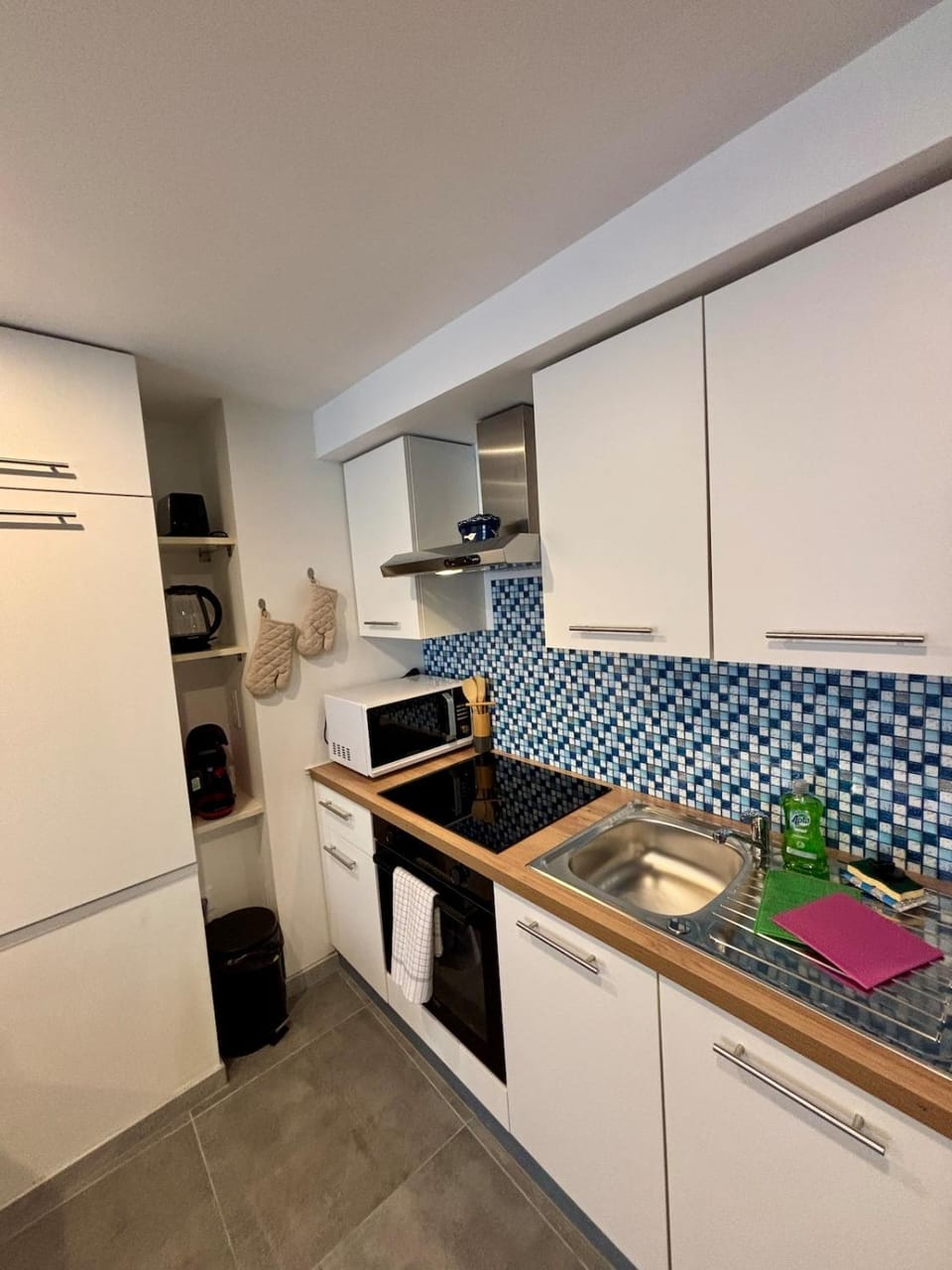 Kitchen or kitchenette, oven, stove, toaster