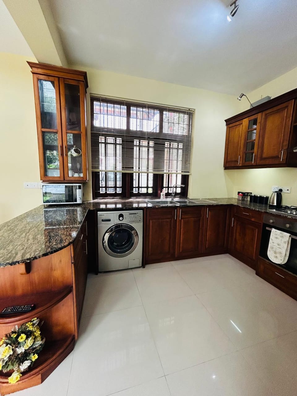 Kitchen or kitchenette, washing machine
