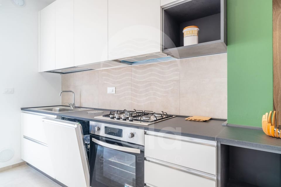 Kitchen or kitchenette, dishwasher, stove