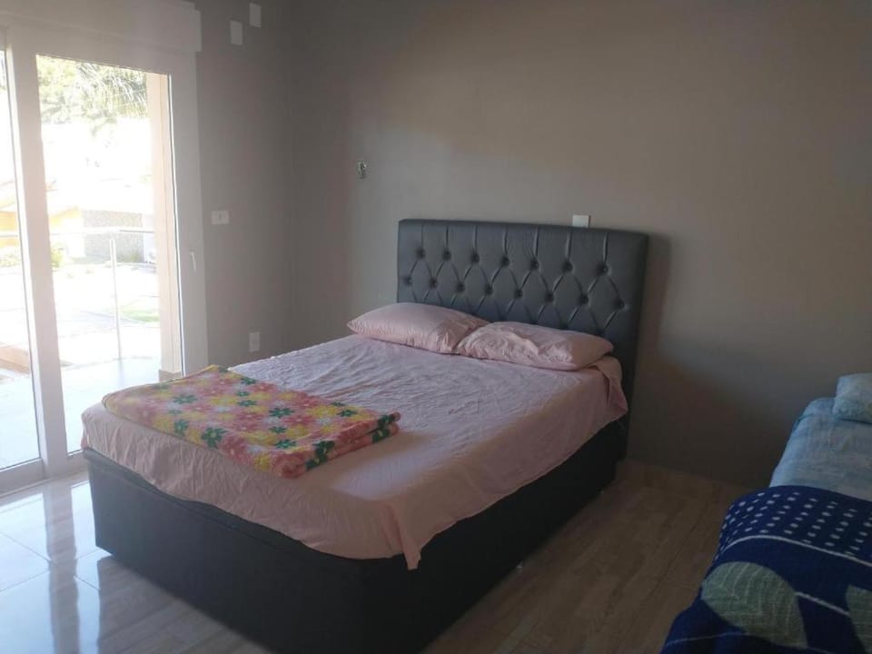 Quarto em residência compartilhada Vacation rental in Florianopolis