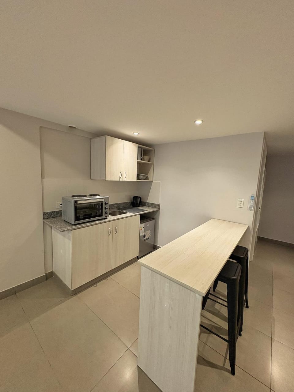 Kitchen or kitchenette, oven, stove