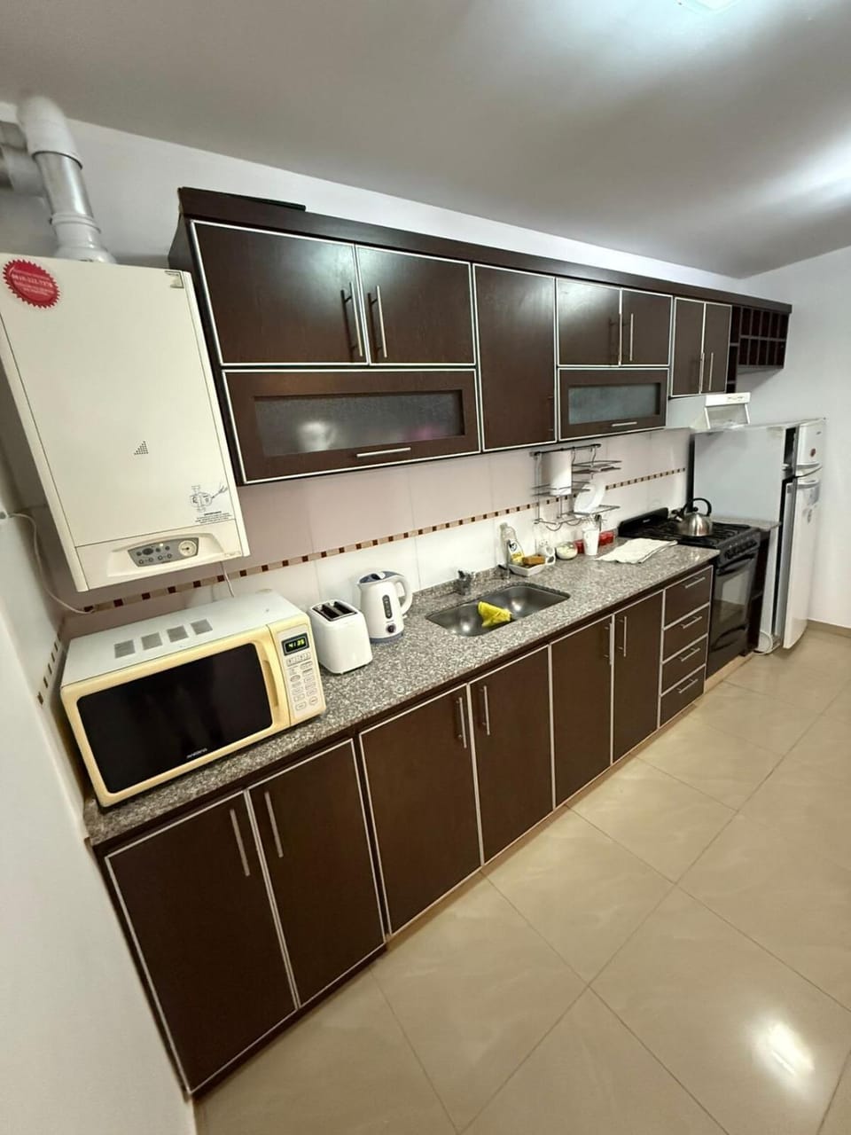 Kitchen or kitchenette, oven, toaster