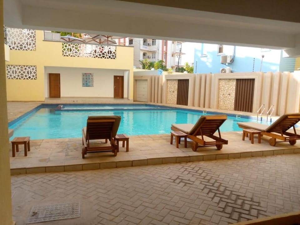 Coral Sands Beach Residence-Nyali-2 minutes walk to beach, AC,Pool, Gym, Restaurant etc Apartment in Mombasa County