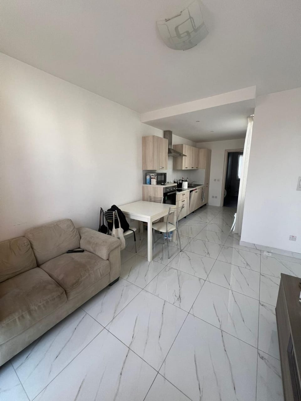 Kitchen or kitchenette, Living room, Seating area, Dining area