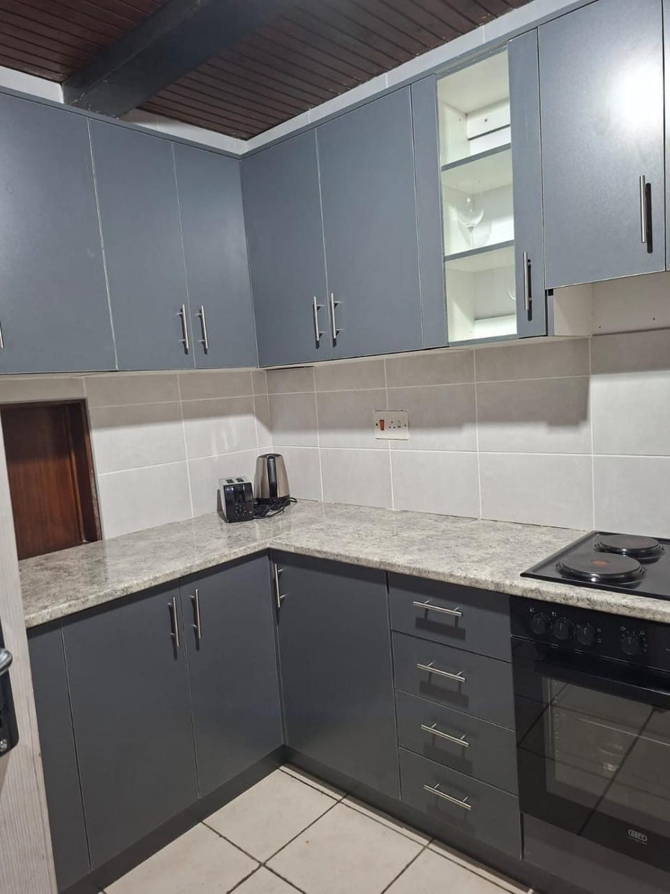 Kitchen or kitchenette, stove