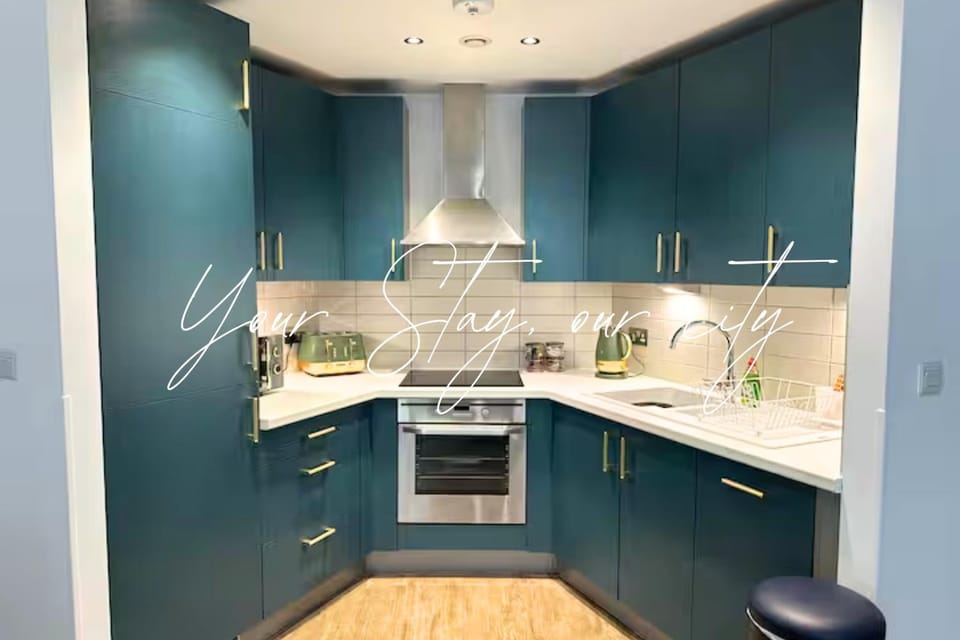 Kitchen or kitchenette, dishwasher, oven, stove
