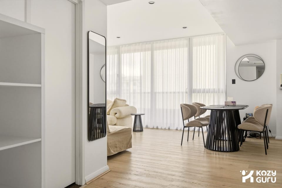 KozyGuru | Waterloo | Designer Pad with City Views Apartment in Sydney