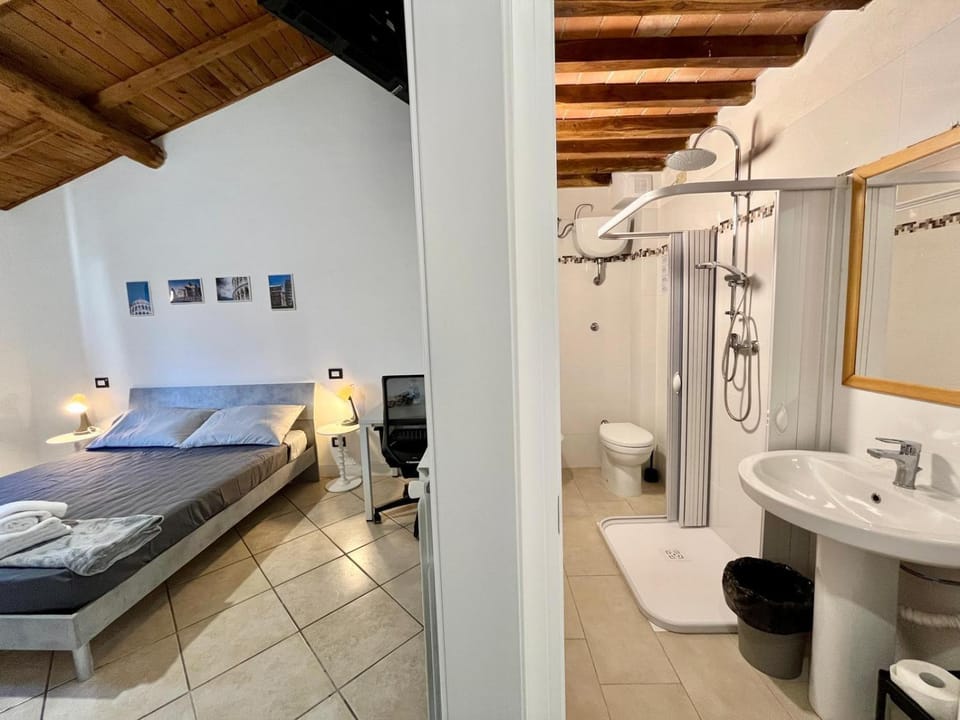 Shower, Toilet, Bed, Bathroom, Photo of the whole room, Bedroom, bidet, towels