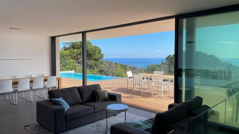 View (from property/room), Balcony/Terrace, Living room, Seating area, Pool view, Sea view, Swimming pool