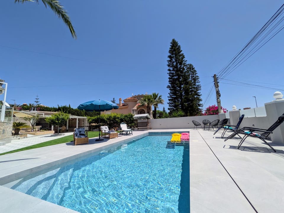 Property building, Living room, Swimming pool