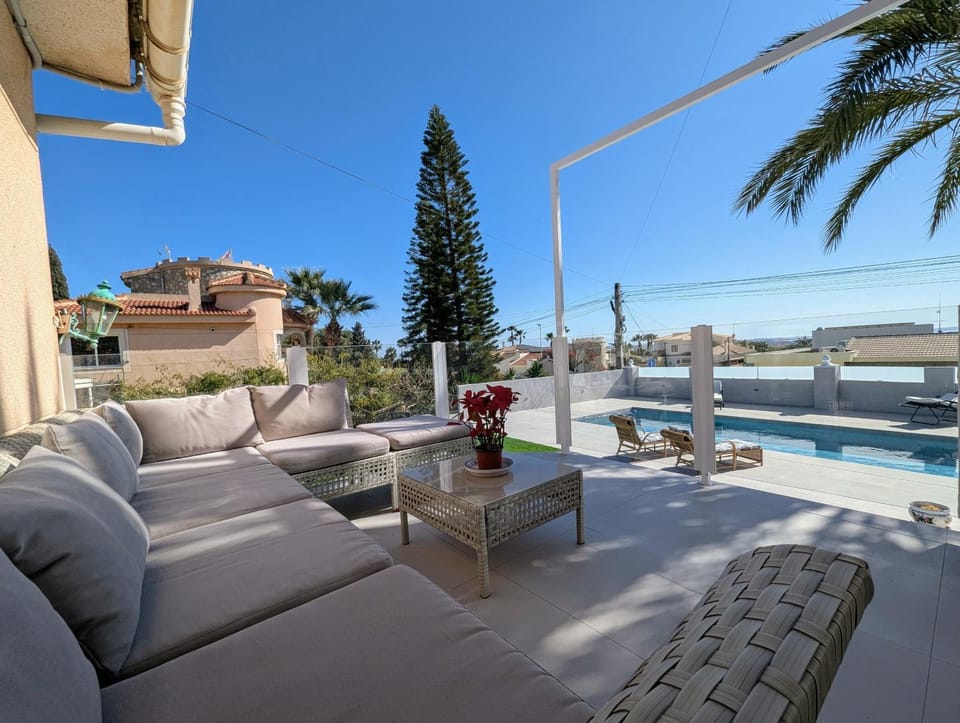 Property building, Living room, Swimming pool