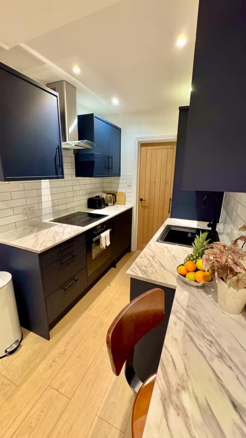 Kitchen or kitchenette, oven, stove