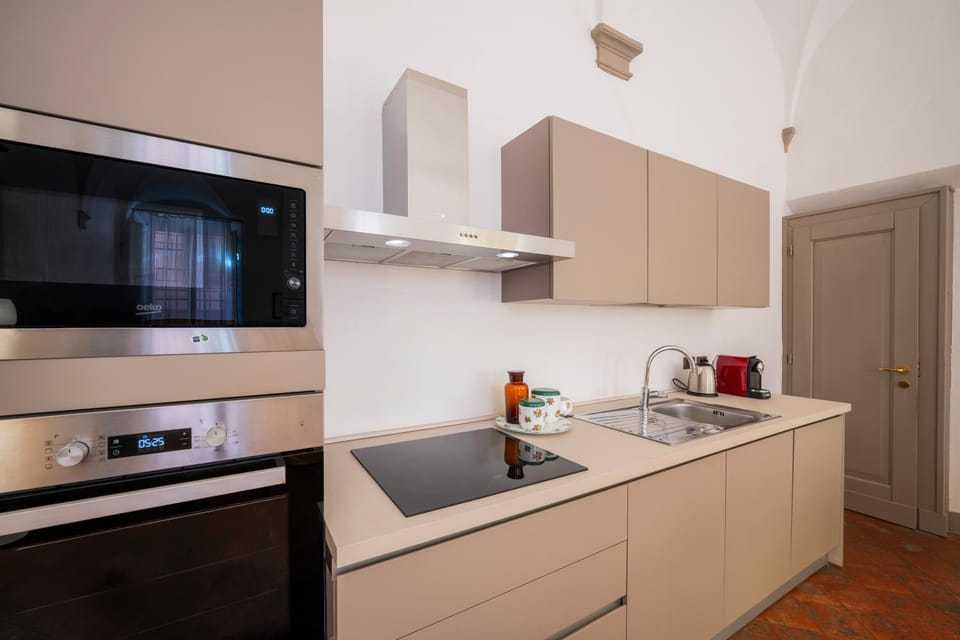Kitchen or kitchenette, oven