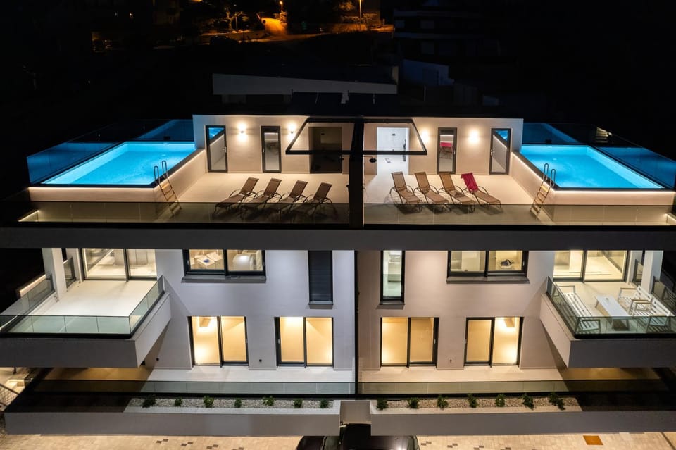 Property building, Night, Balcony/Terrace, Swimming pool, sunbed