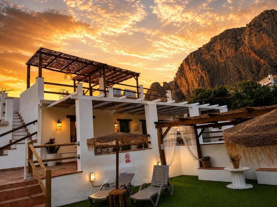 Property building, Patio, View (from property/room), Balcony/Terrace, Mountain view, Sunset