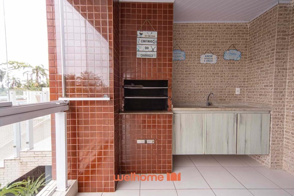 Apto em Bertioga a beira mar com churrasqueira Apartment in Bertioga