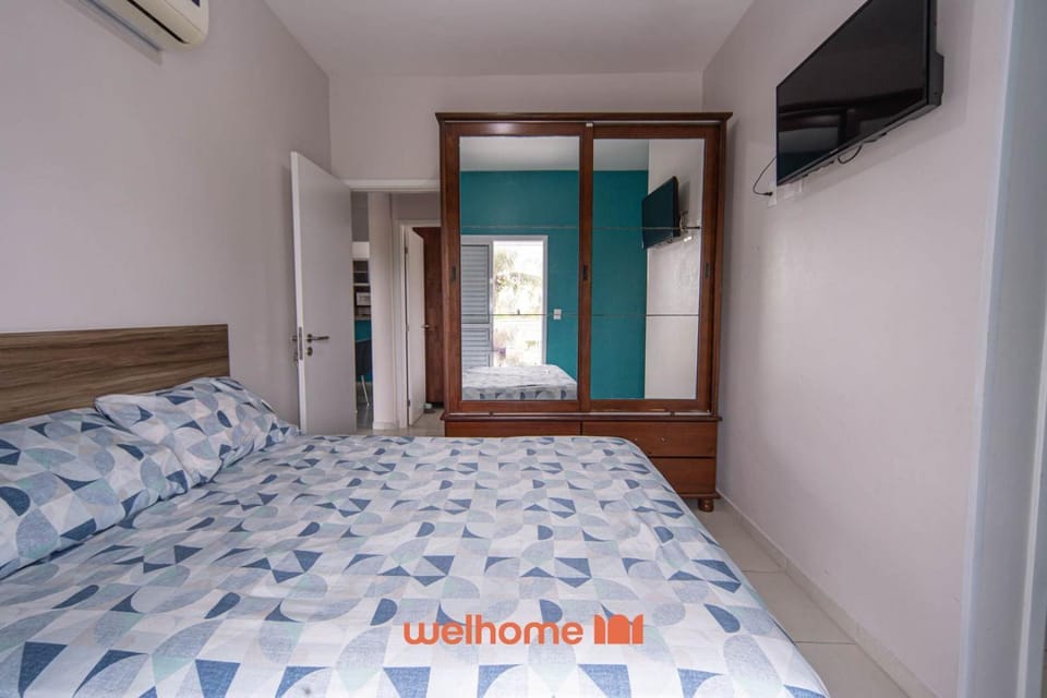 Apto em Bertioga a beira mar com churrasqueira Apartment in Bertioga