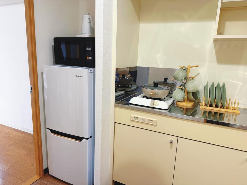 Kitchen or kitchenette, stove