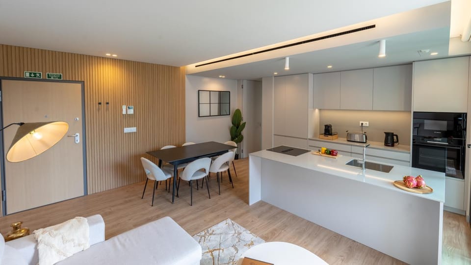 Living room, Seating area, Dining area, oven, stove, toaster