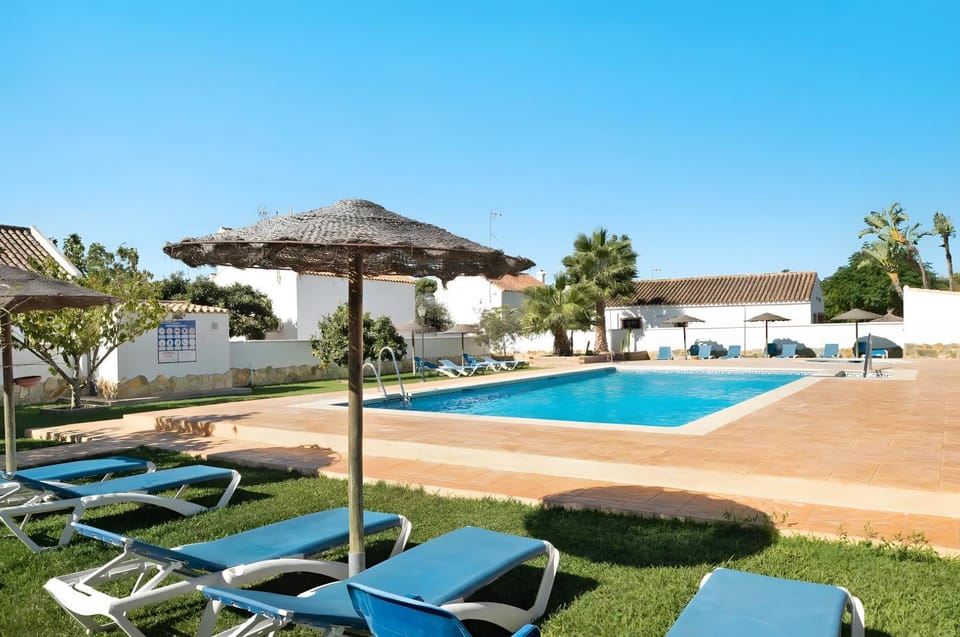 Property building, Living room, Swimming pool