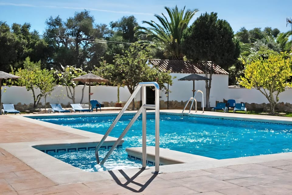 Property building, Living room, Swimming pool