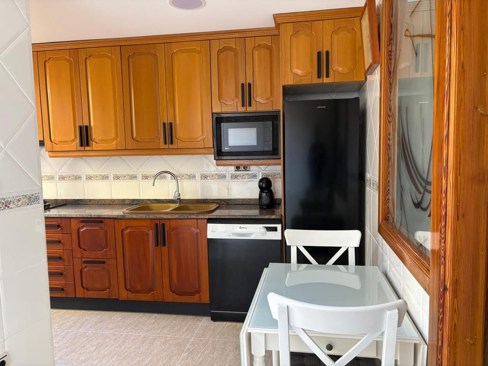 Kitchen or kitchenette, dishwasher, oven, stove, toaster, kitchen