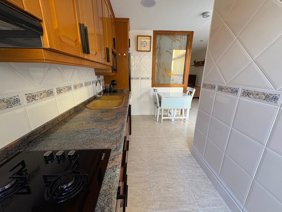 Kitchen or kitchenette, dishwasher, stove, kitchen