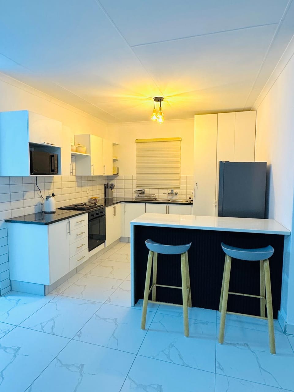 Kitchen or kitchenette, oven, stove