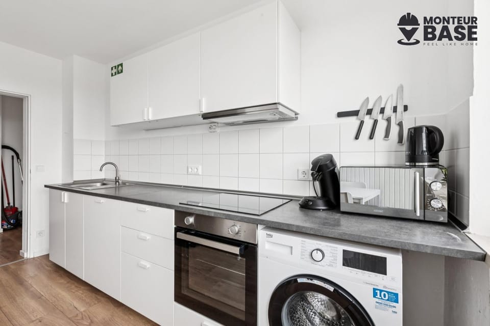 Kitchen or kitchenette, dishwasher, stove, washing machine, dryer