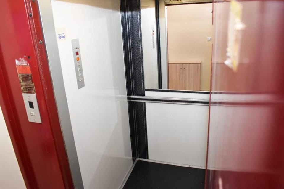 Property building, elevator