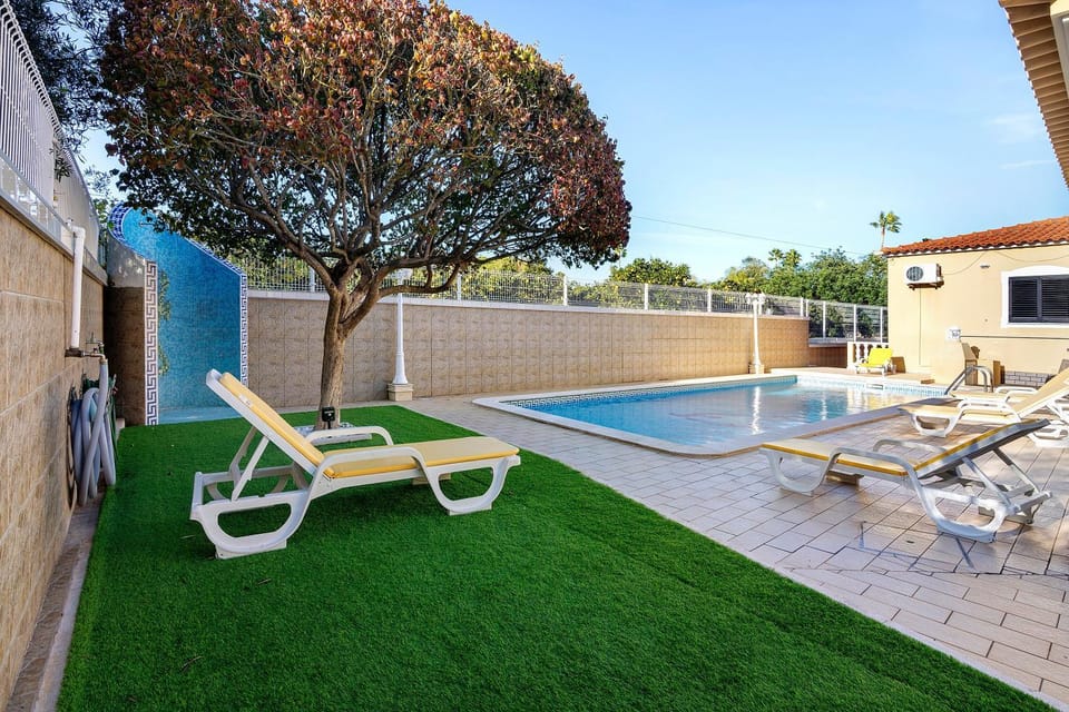 Property building, Living room, Swimming pool