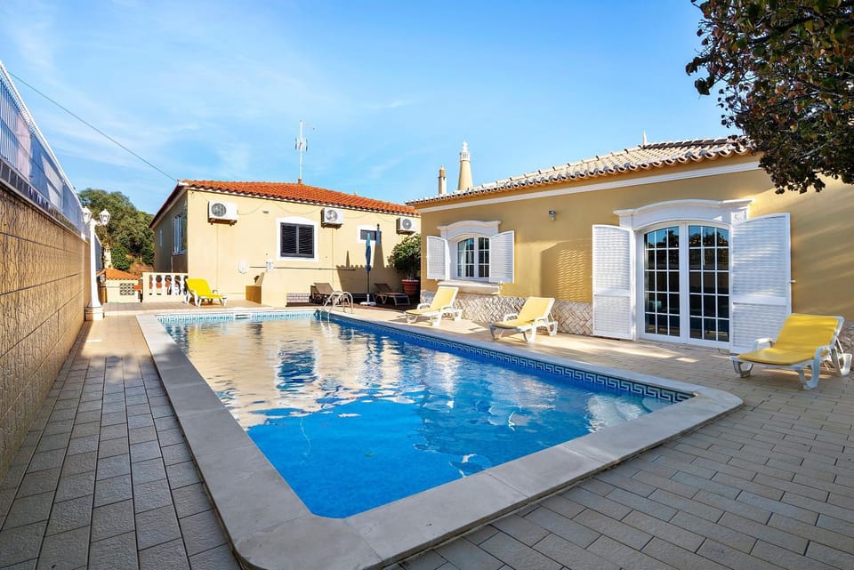 Property building, Living room, Swimming pool