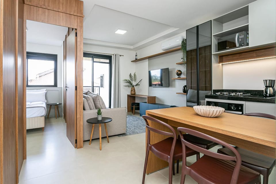Kitchen or kitchenette, Living room, Seating area, Dining area