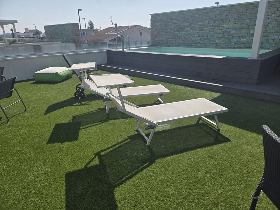 Patio, Day, Solarium, Pool view, Swimming pool, sunbed