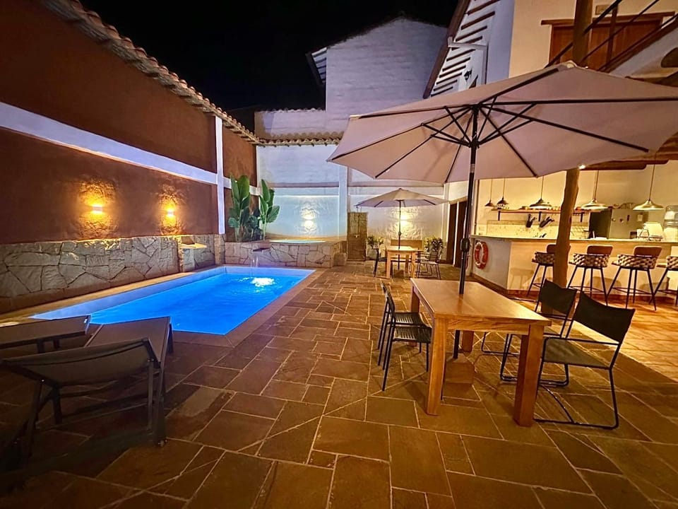 Patio, Night, Pool view, Swimming pool, sunbed