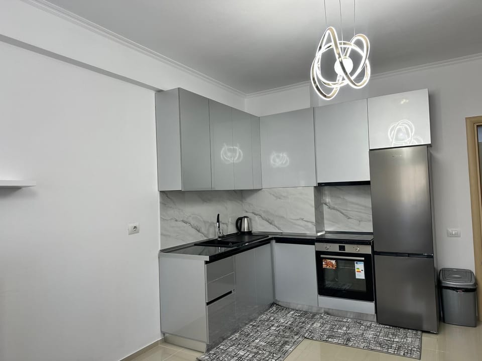 Kitchen or kitchenette, oven, stove