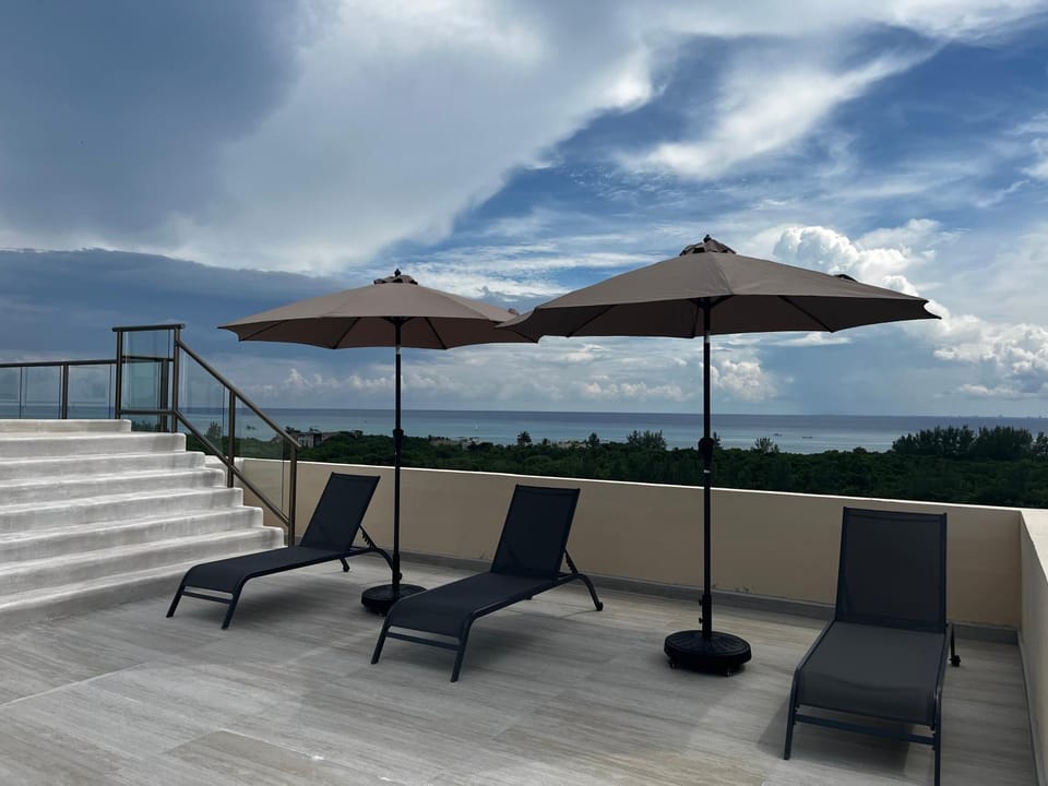 Patio, Natural landscape, Balcony/Terrace, Living room, Sea view