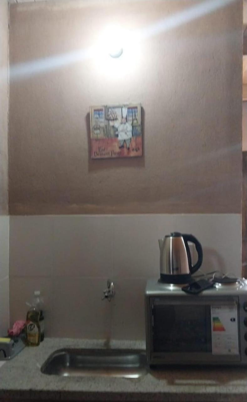 Kitchen or kitchenette, stove, kitchen