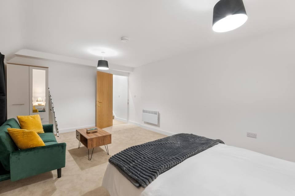 Bed, Living room, Seating area, Bedroom