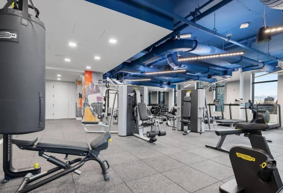 Central 2BR Condo in Downtown Boston & T-Station Apartment in South Boston