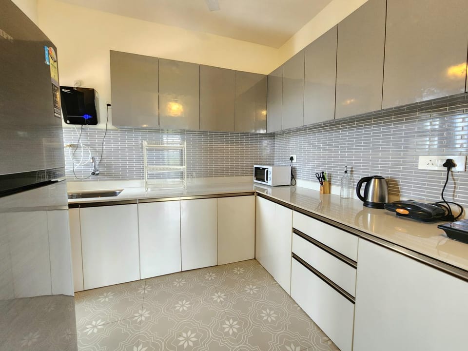 Kitchen or kitchenette, oven, stove, toaster