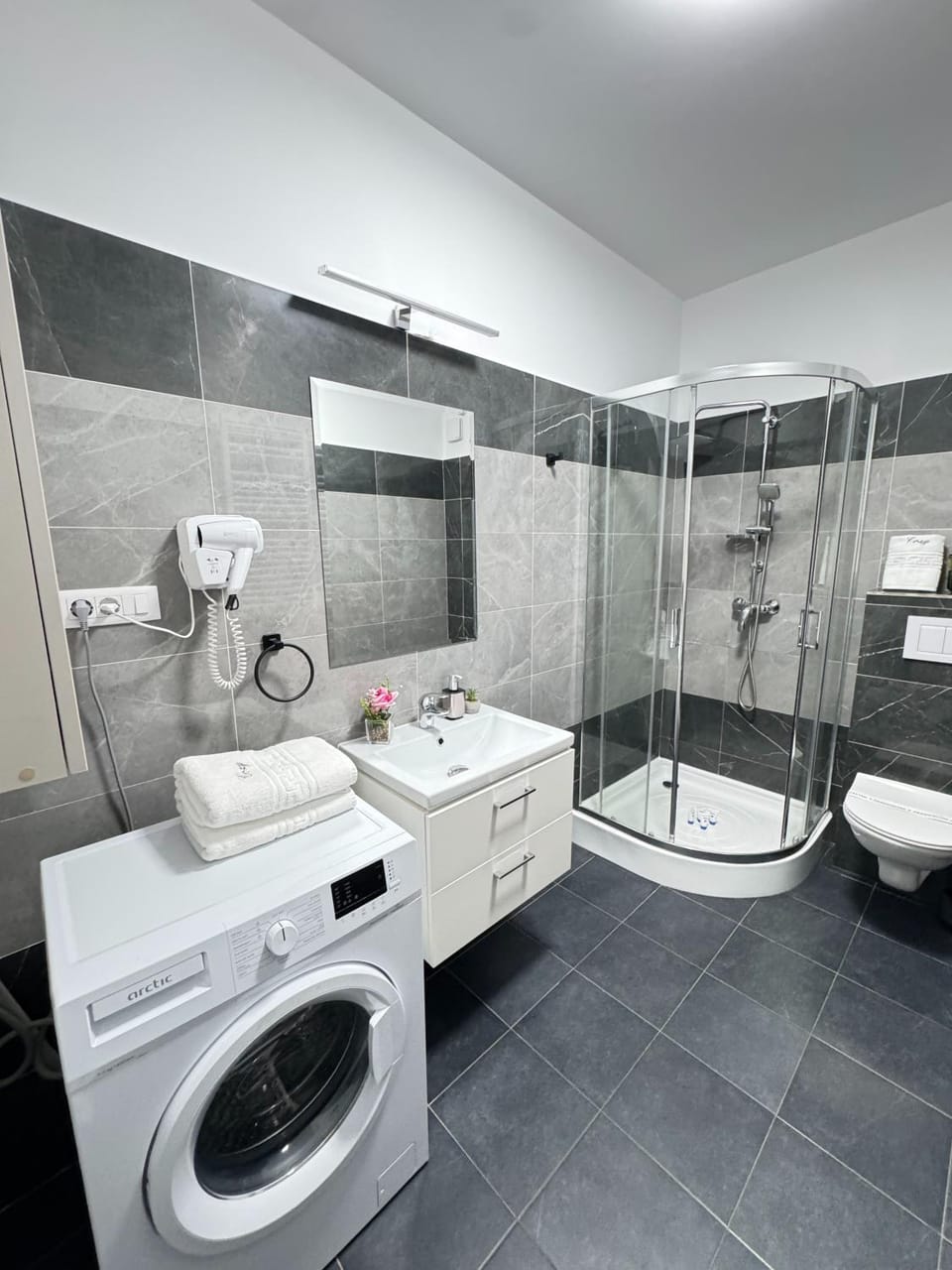 Shower, Toilet, Bathroom, Bath, towels, washing machine, dryer