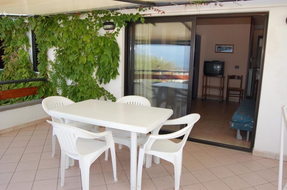 Patio, Bed, Bathroom, Balcony/Terrace, Kitchen or kitchenette, Living room, Decorative detail, Seating area, Dining area, Sea view