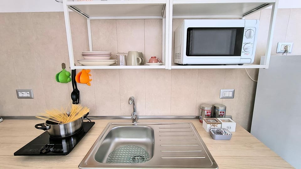 Kitchen or kitchenette, stove