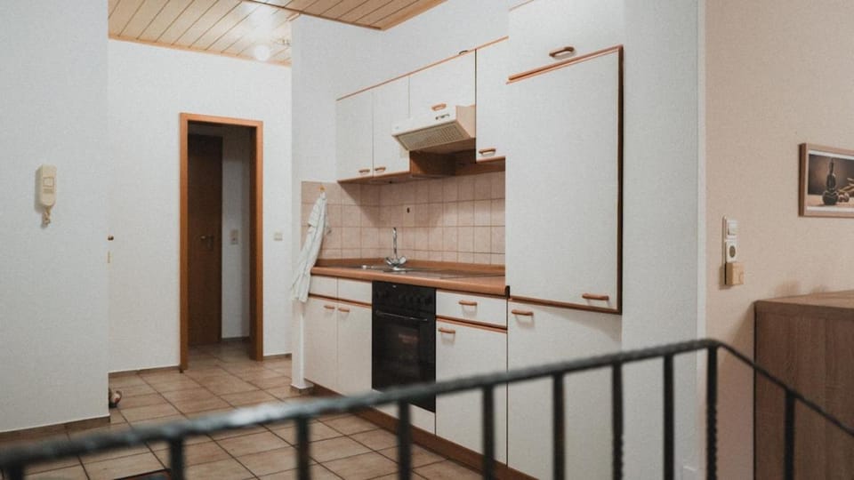 Kitchen or kitchenette, oven, stove