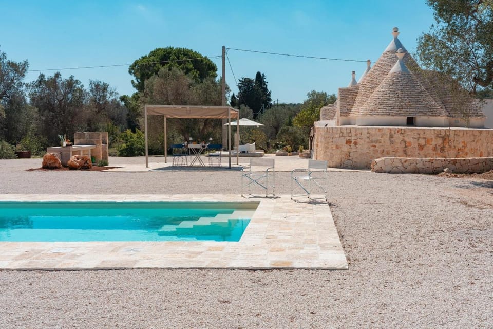 Property building, Living room, Swimming pool